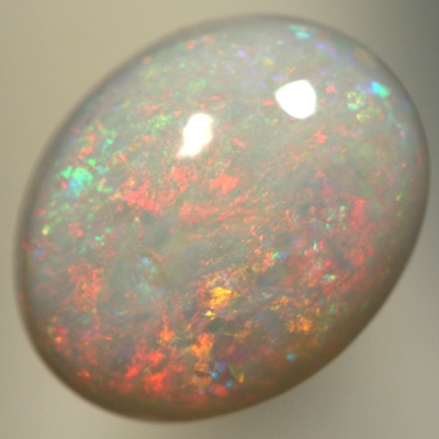 SOLID SEMI BLACK OPAL Pretty sparkles over a high dome